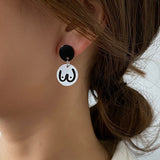 White/Black Booby Stud Earrings E189
