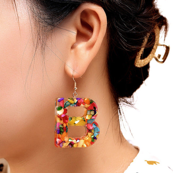Large shop letter earrings